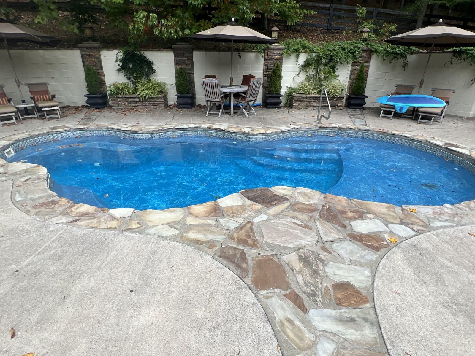 Balanced clear blue pool water