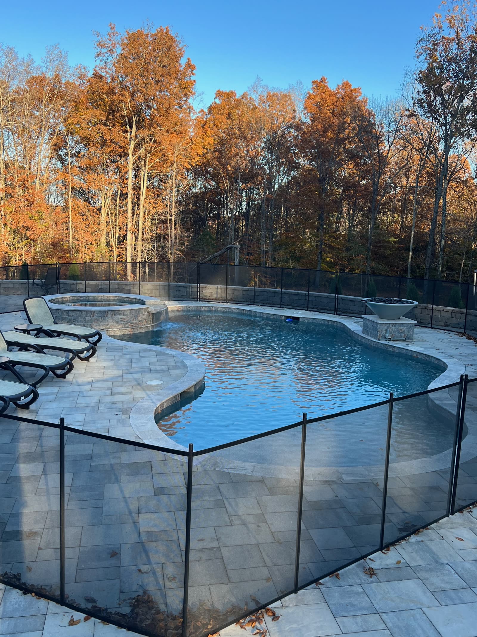 Restored crystal-clear pool with spa
