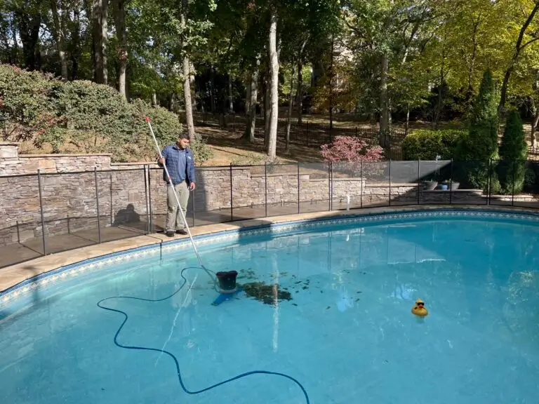 Modern rectangular pool with paver deck